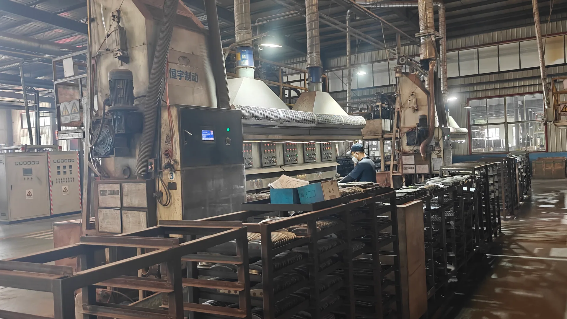 Brake pads staged at the Heng Yu heat-treatment line